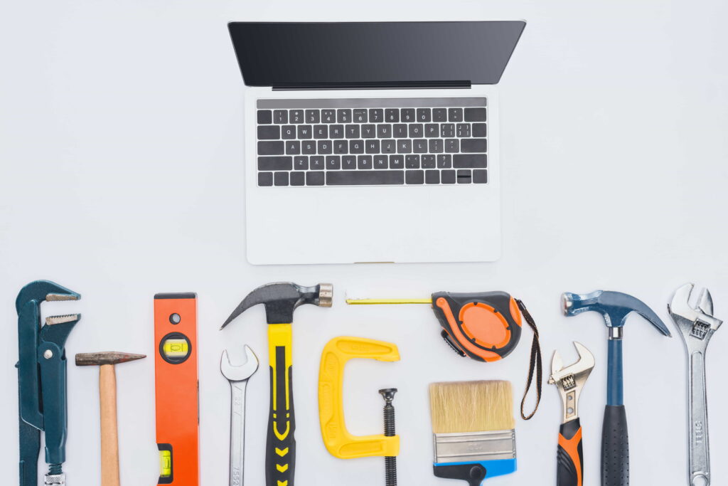 a laptop with tools on it